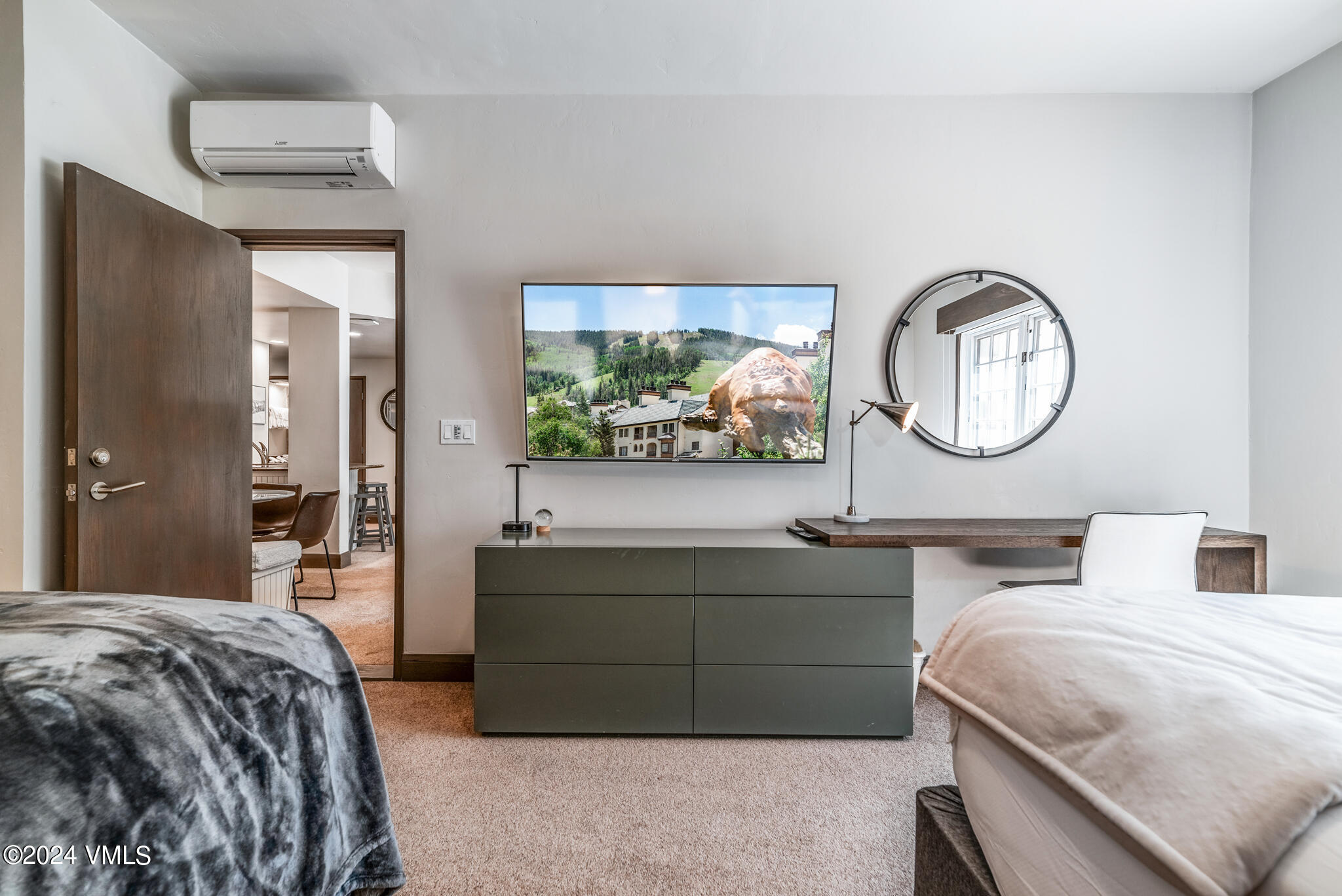 120 Offerson Road, Unit F230 Beaver Creek, CO 81620 - Photo 24 of 48 a bedroom with a bed mirror and a window