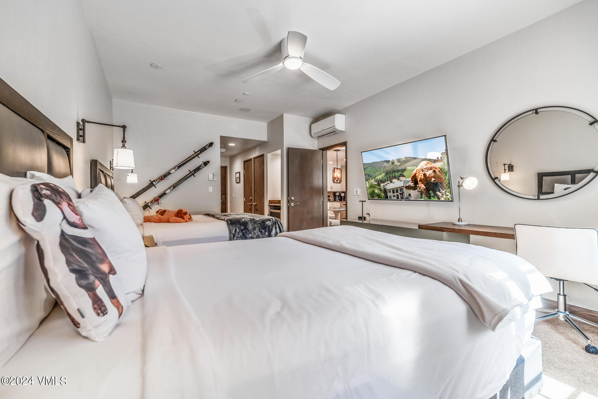 120 Offerson Road, Unit F230 Beaver Creek, CO 81620 - Photo 25 of 48 a bedroom with bed and a large mirror