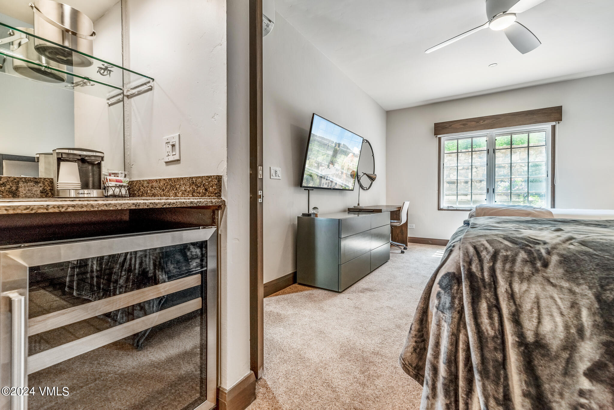 120 Offerson Road, Unit F230 Beaver Creek, CO 81620 - Photo 27 of 48 a bed room with a bed and a television