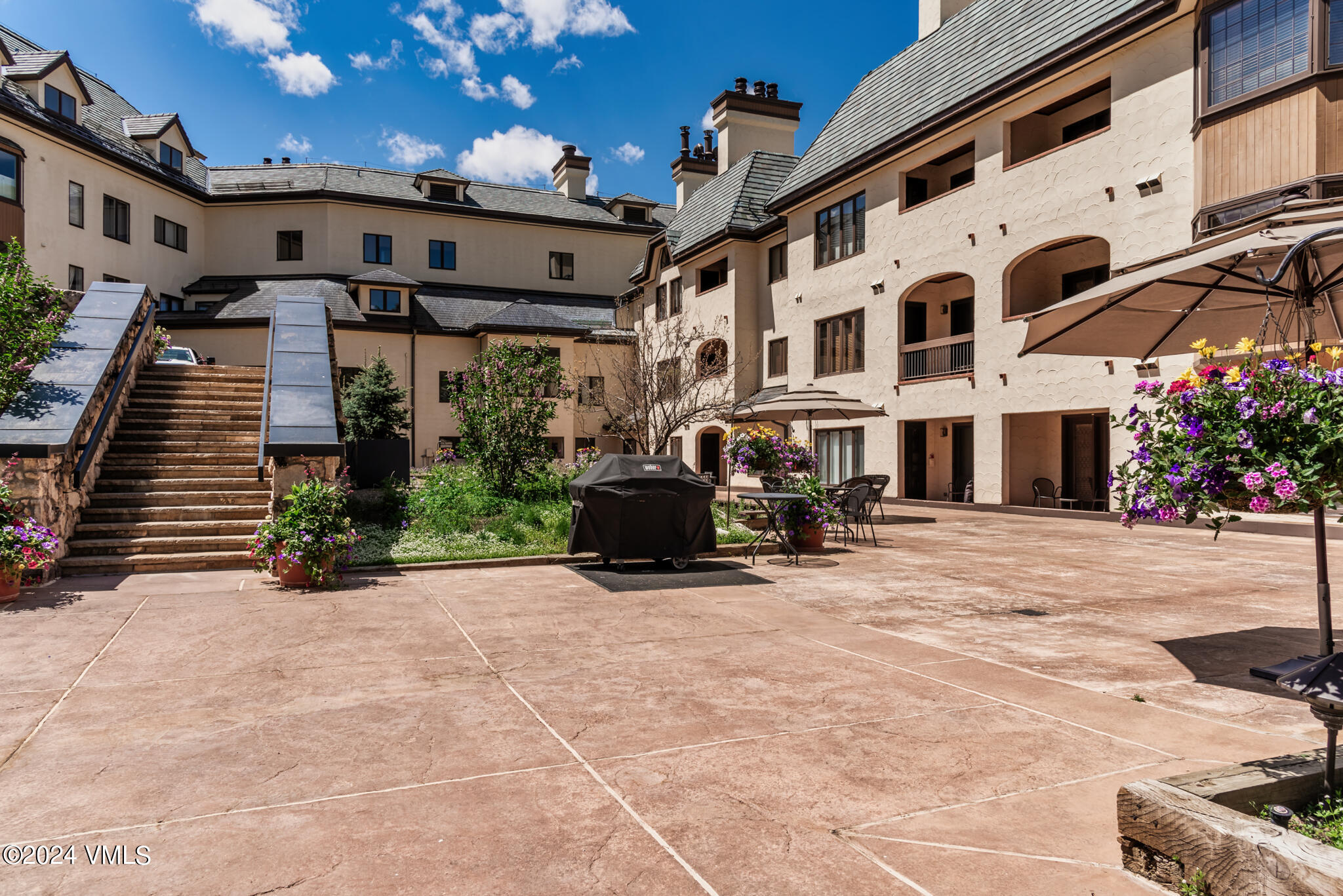 120 Offerson Road, Unit F230 Beaver Creek, CO 81620 - Photo 3 of 48 a view of a building with many windows
