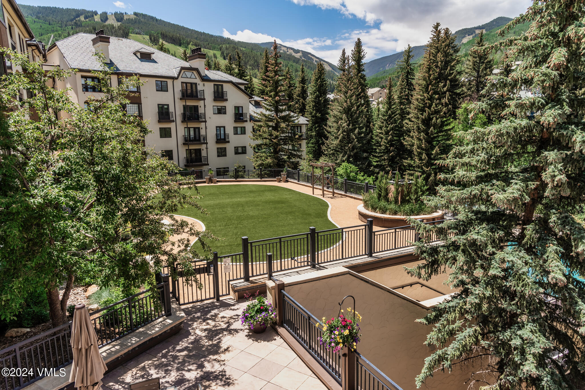 120 Offerson Road, Unit F230 Beaver Creek, CO 81620 - Photo 33 of 48 a view of a chairs and table in the patio