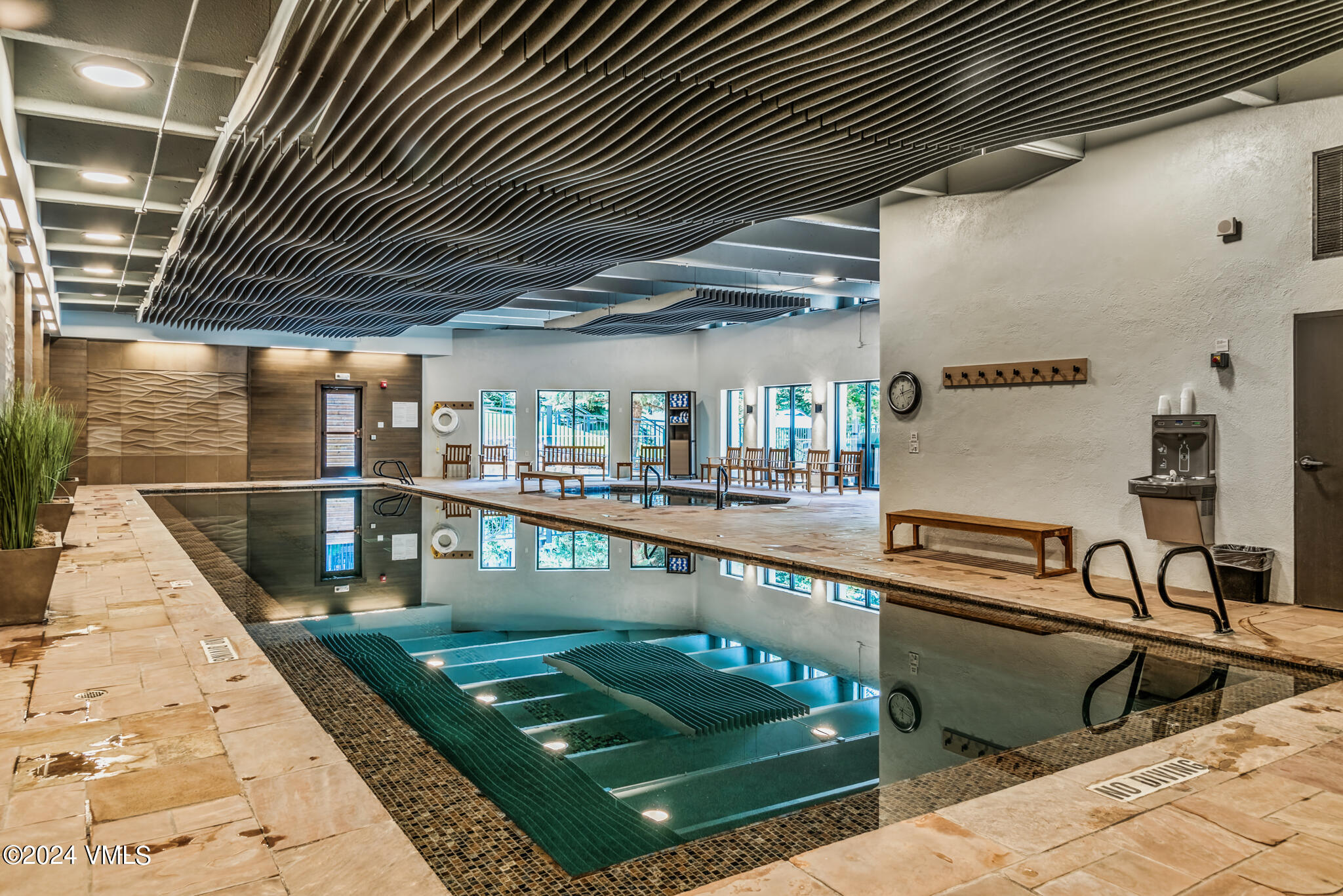 120 Offerson Road, Unit F230 Beaver Creek, CO 81620 - Photo 34 of 48 a view of a swimming pool with a patio