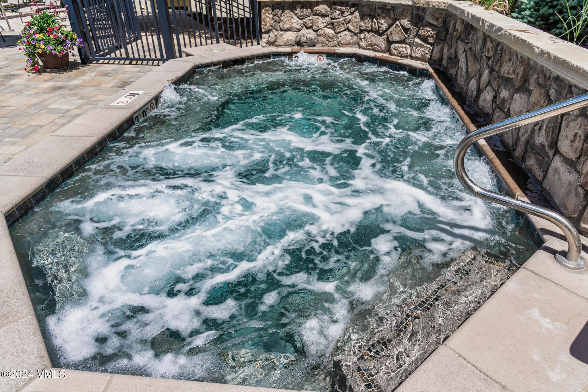 120 Offerson Road, Unit F230 Beaver Creek, CO 81620 - Photo 37 of 48 a view of a backyard with wooden fence