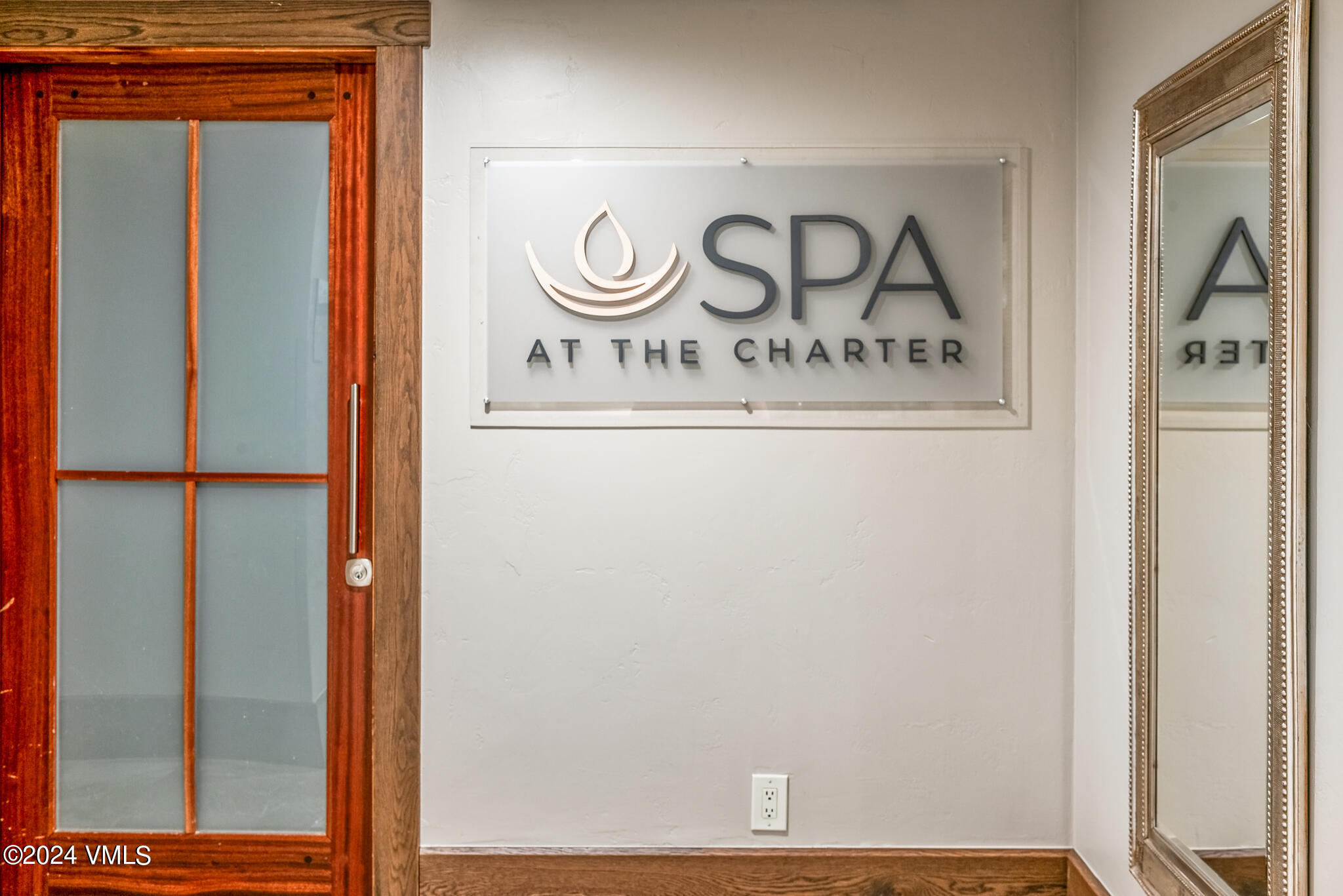 120 Offerson Road, Unit F230 Beaver Creek, CO 81620 - Photo 44 of 48 a view of a hallway with wooden door