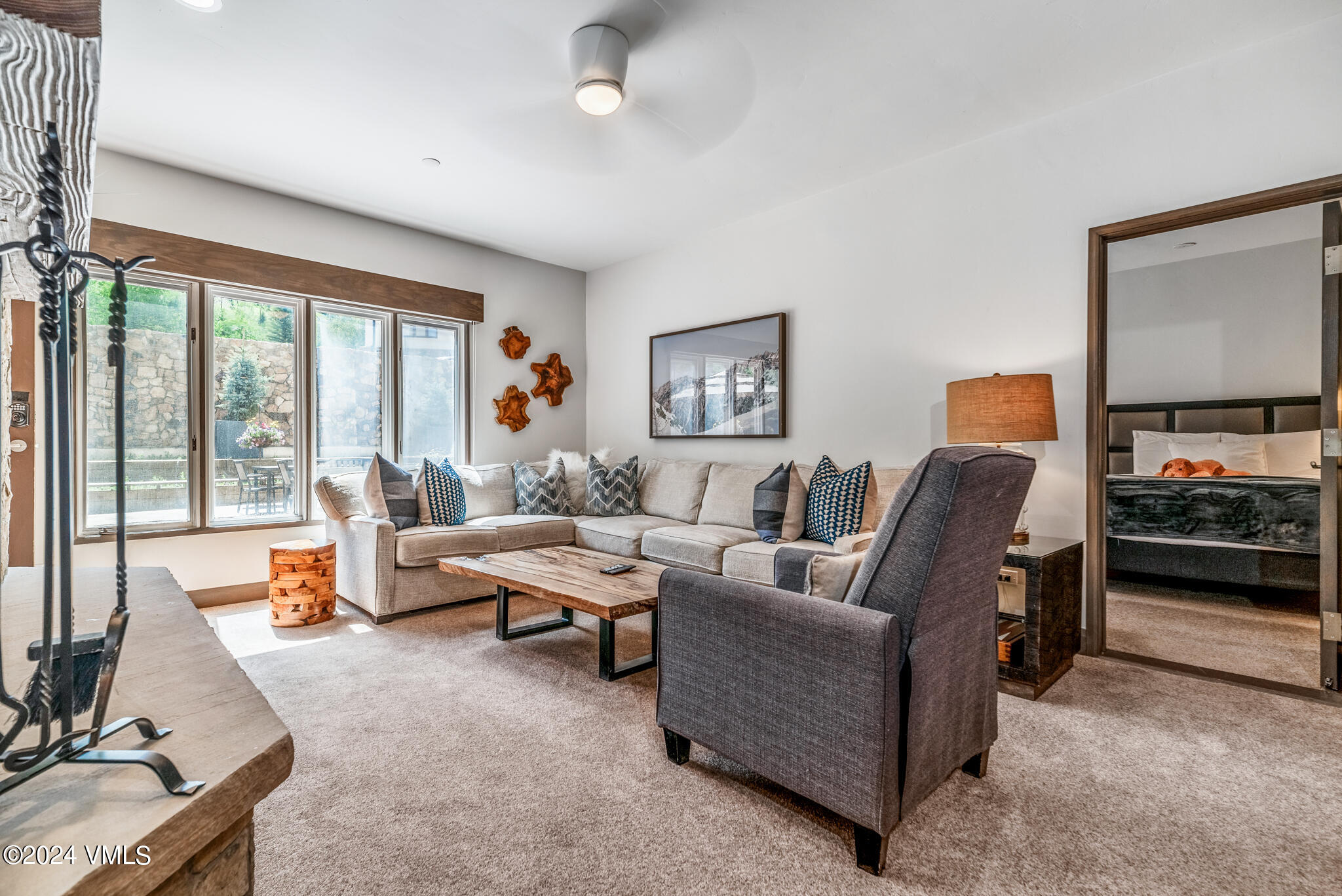 120 Offerson Road, Unit F230 Beaver Creek, CO 81620 - Photo 8 of 48 a living room with furniture and a flat screen tv