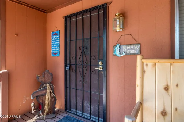 a view of an entryway with wooden wall
