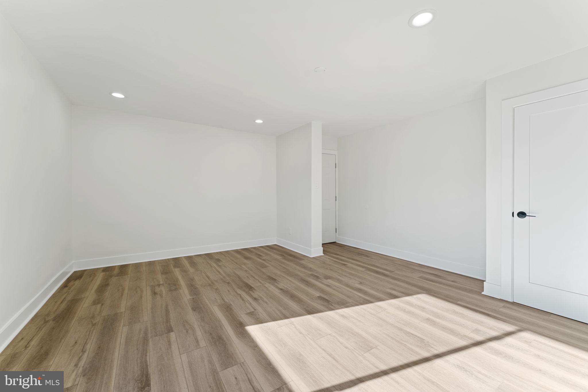 649 Notabene Drive, Unit 6 Alexandria, VA 22305 - Photo 10 of 17 a view of a room with wooden floor and white walls