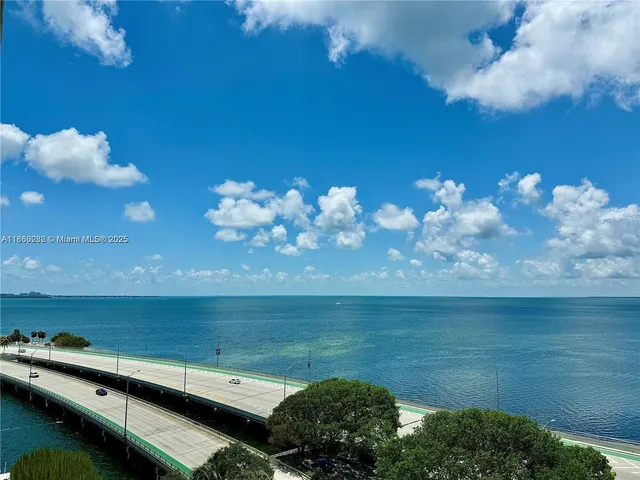 a view of a room with a lake view and a lake view