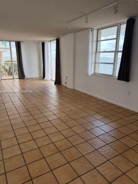 150 Southeast 25th Road, Unit 6A Miami, FL 33129 - Photo 2 of 9 a view of a livingroom and window