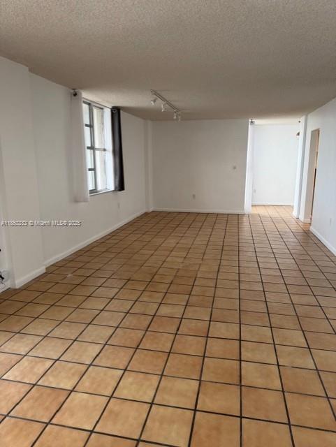 150 Southeast 25th Road, Unit 6A Miami, FL 33129 - Photo 3 of 9 a view of an empty room and window
