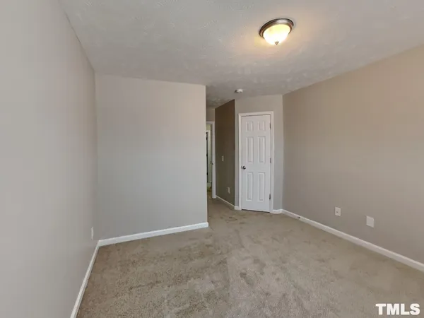 an empty room with an entryway