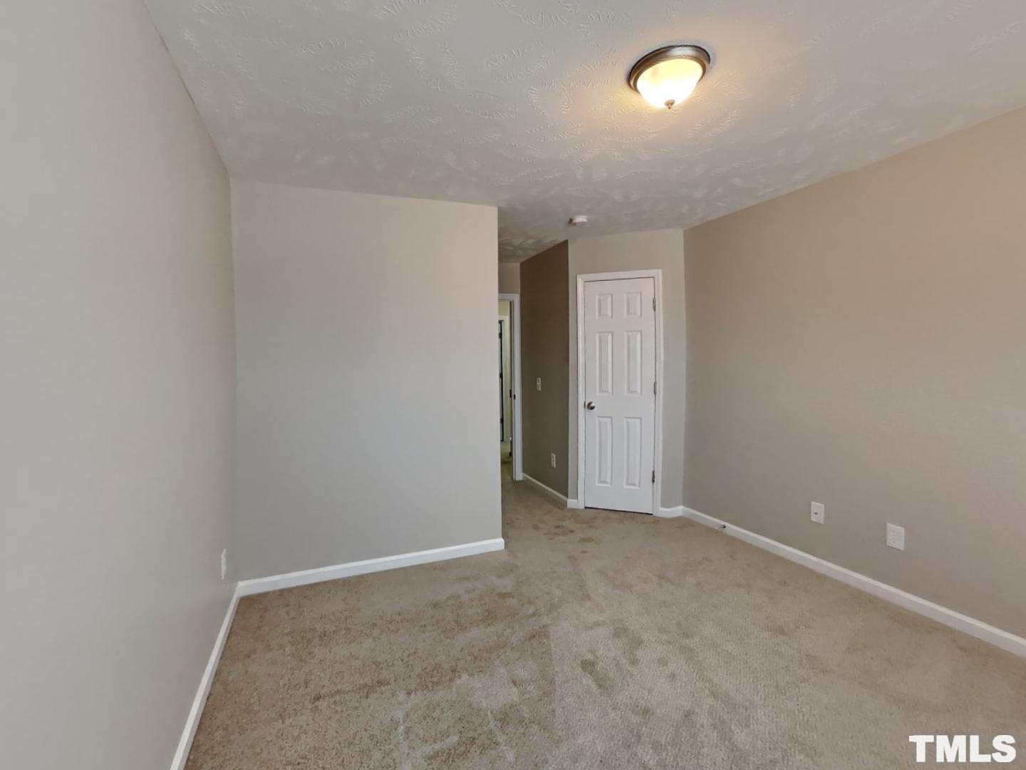 200 Lattimore Road Cameron, NC 28326 - Photo 13 of 19 an empty room with an entryway