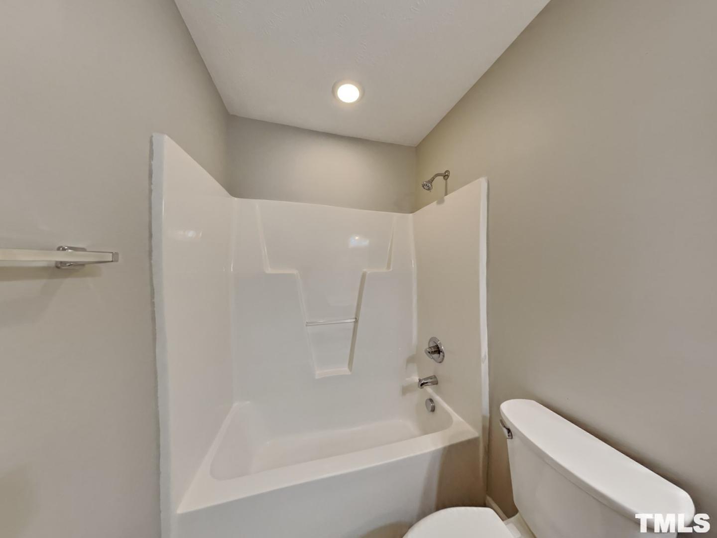 200 Lattimore Road Cameron, NC 28326 - Photo 15 of 19 a bathroom with a toilet and a bathtub