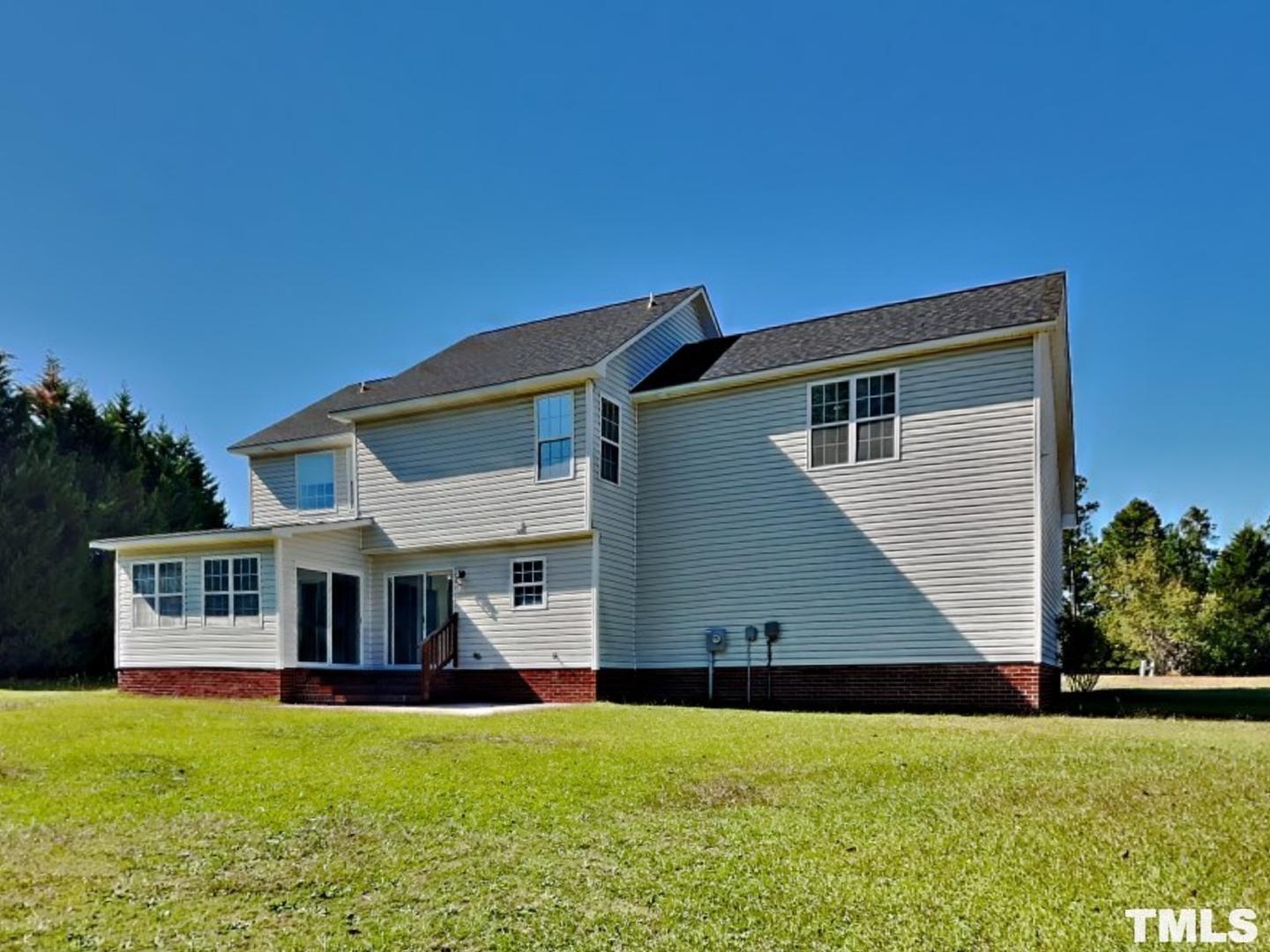 200 Lattimore Road Cameron, NC 28326 - Photo 19 of 19 a view of a house with a backyard