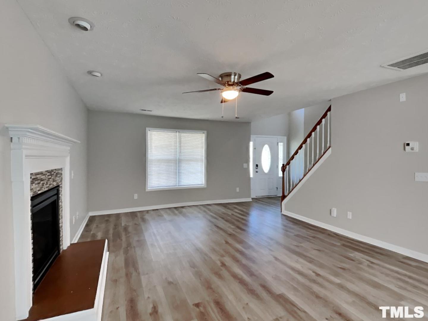200 Lattimore Road Cameron, NC 28326 - Photo 2 of 19 wooden floor in an empty room with a window