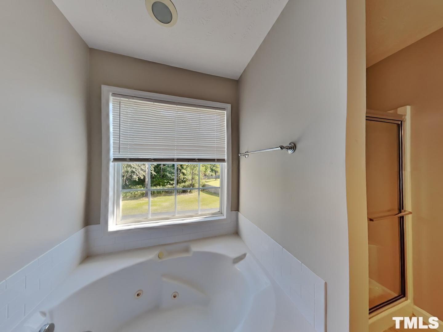 200 Lattimore Road Cameron, NC 28326 - Photo 9 of 19 a view of an empty room with a window