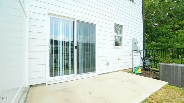 a view of a backyard of the house