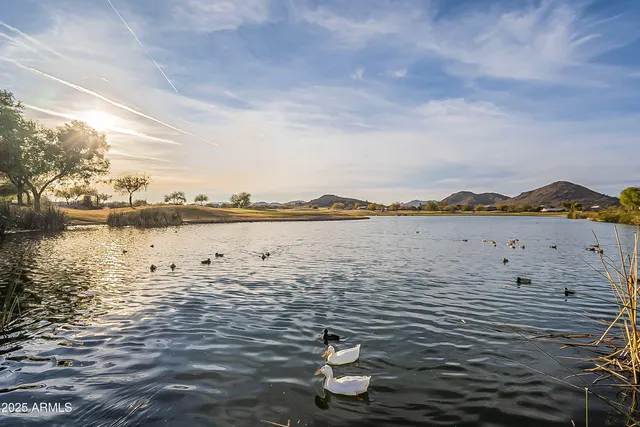 an aerial view of residential houses and outdoor space
