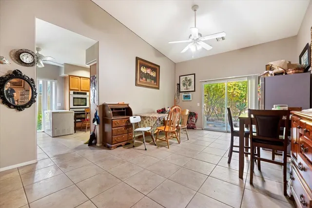 a view of a livingroom with furniture and a window