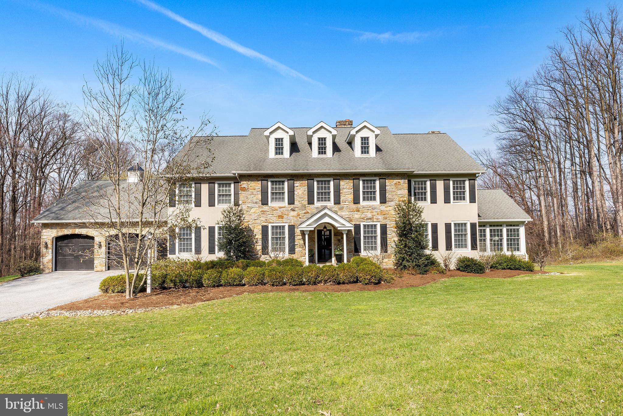 6058 Buena Vista Road Gap, PA 17527 - Photo 1 of 118 a front view of a house with a garden and plants