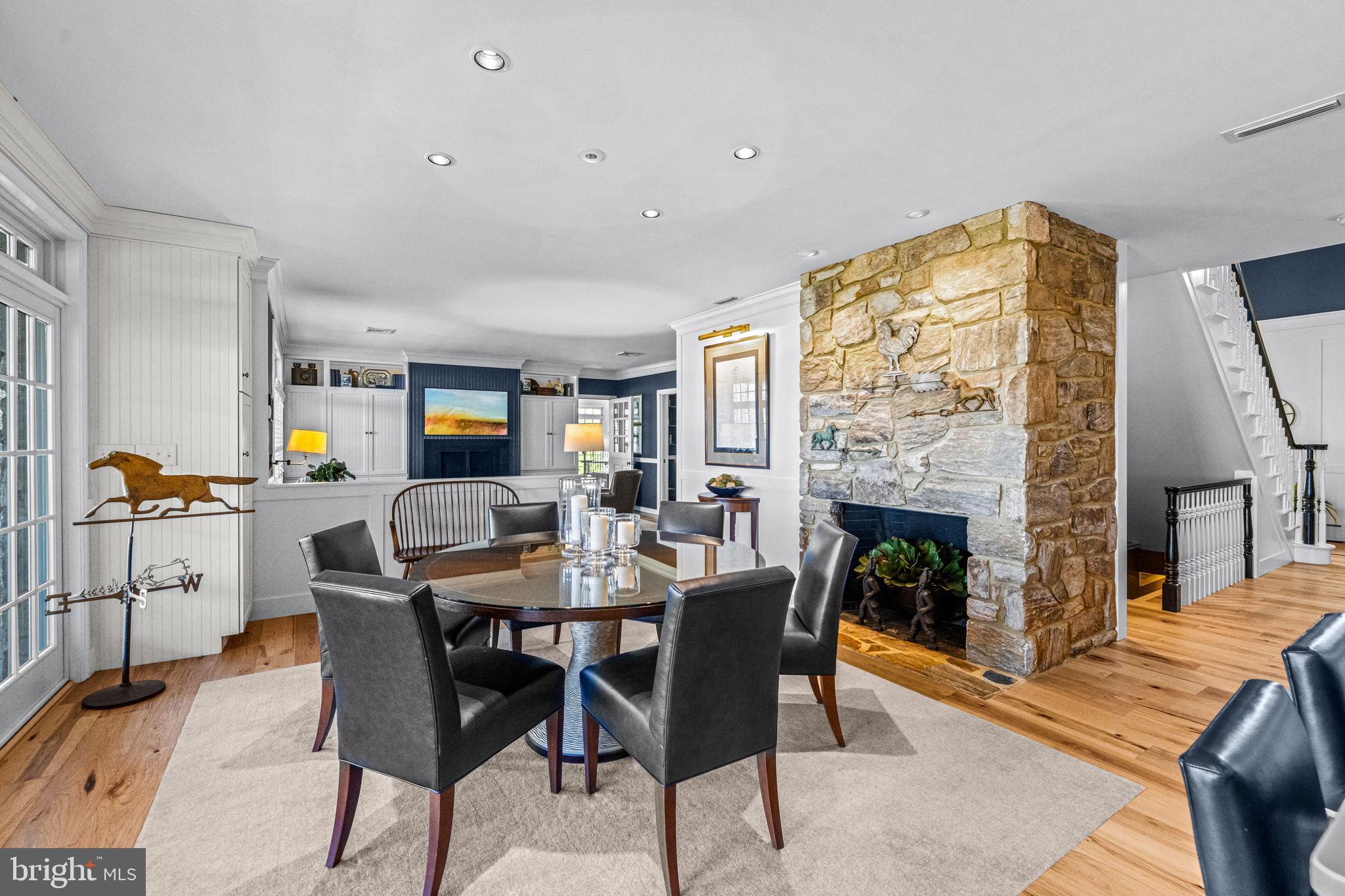 6058 Buena Vista Road Gap, PA 17527 - Photo 31 of 118 a dining room with furniture and a fireplace