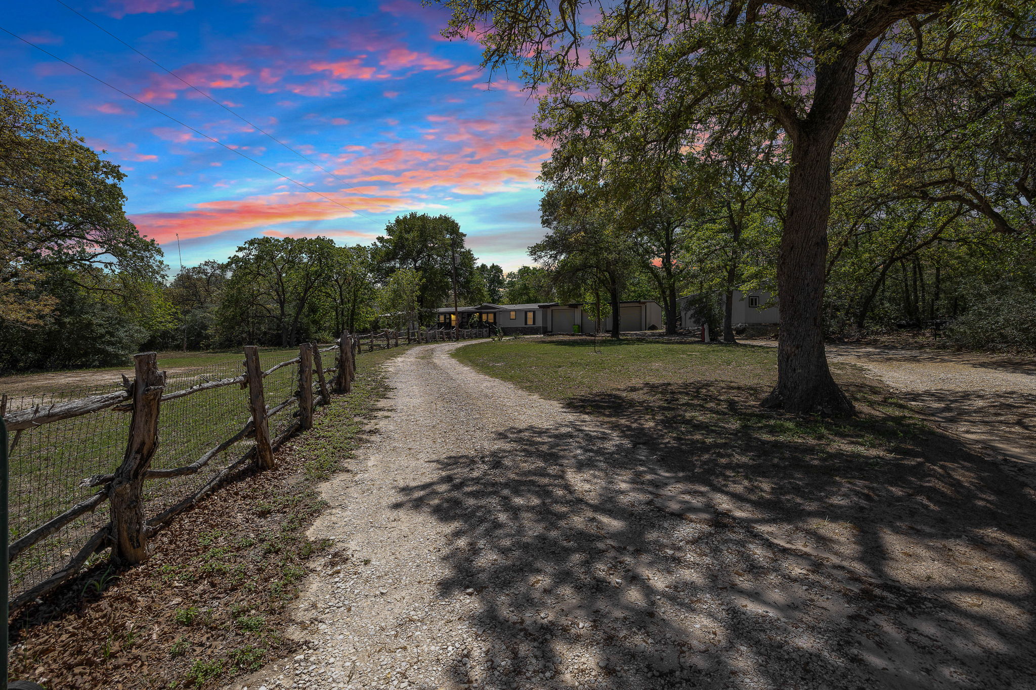 541 Hidden Oaks Drive Elgin, TX 78621 - Photo 4 of 40 a twilight view of your piece of PARADISE
