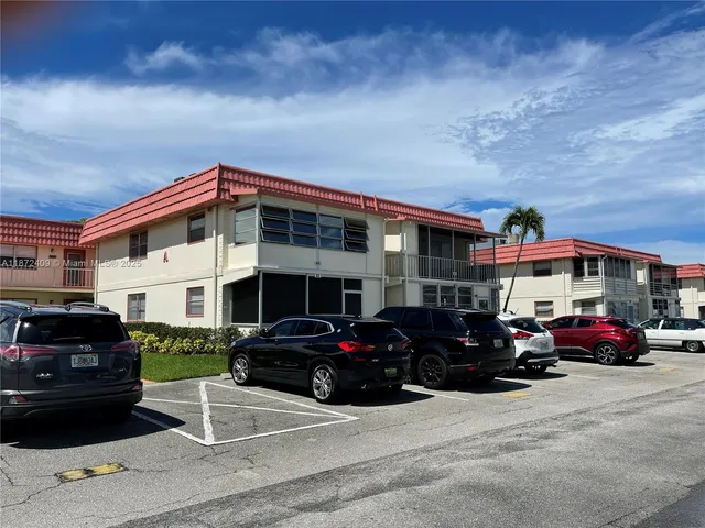 a car parked in front of a building