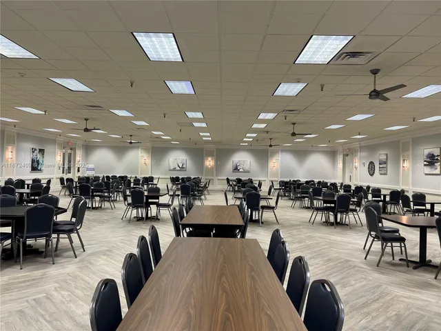 a backyard of a house with outdoor seating