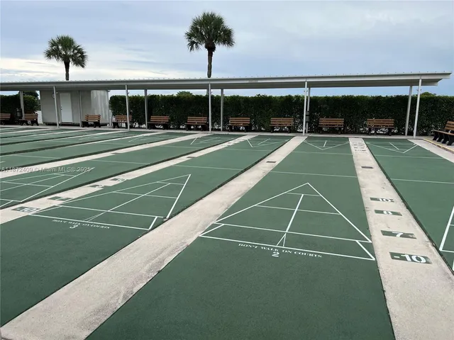 a view of a lake with outdoor seating