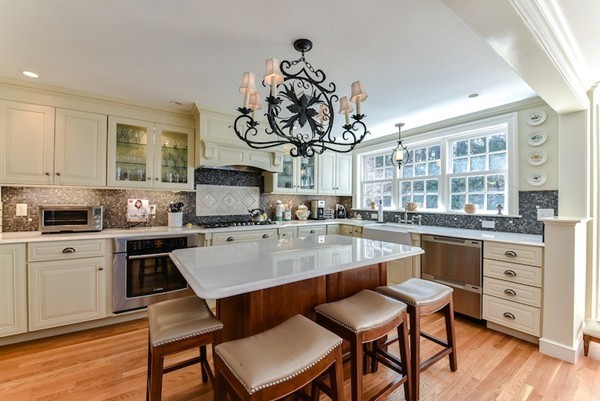 11 Alden Road Wellesley, MA 02481 - Photo 13 of 29 a kitchen with a center island appliances and cabinets