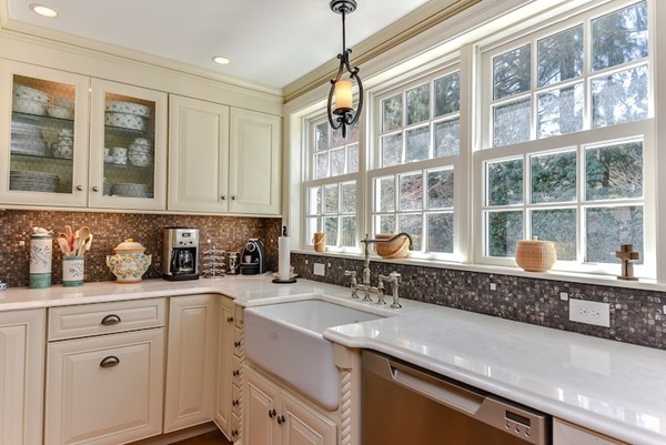 11 Alden Road Wellesley, MA 02481 - Photo 14 of 29 a kitchen with granite countertop a sink a stove and cabinets