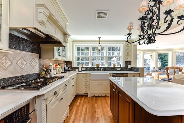 11 Alden Road Wellesley, MA 02481 - Photo 15 of 29 a kitchen with a sink stove and cabinets