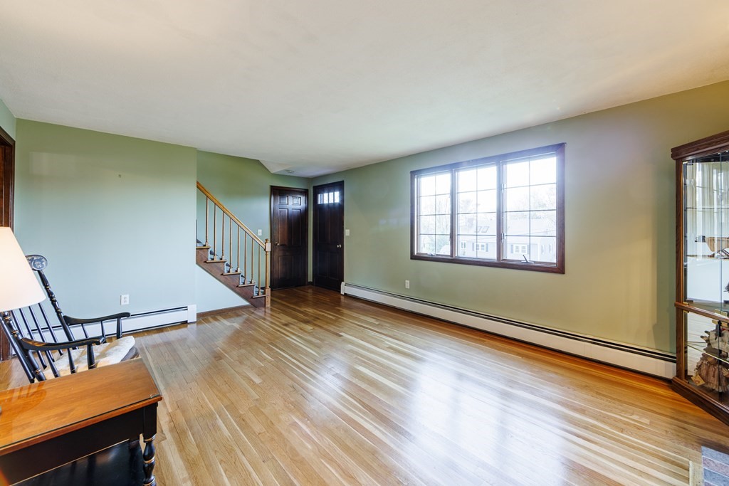 2 Lee Road Groveland, MA 01834 - Photo 33 of 41 wooden floor in an empty room with a window