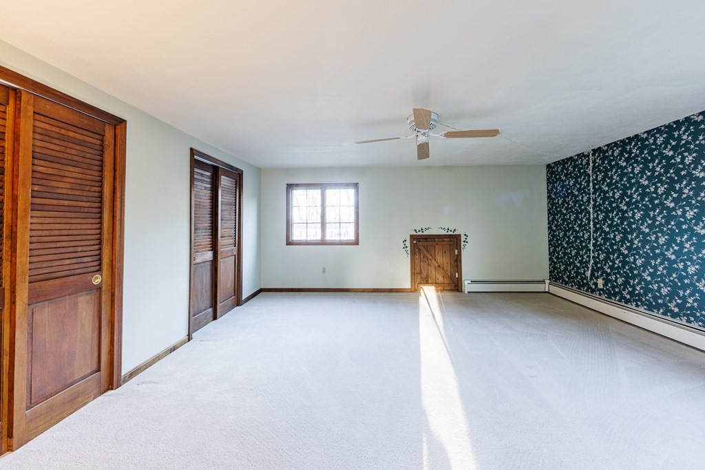 2 Lee Road Groveland, MA 01834 - Photo 34 of 41 a view of an empty room with a window