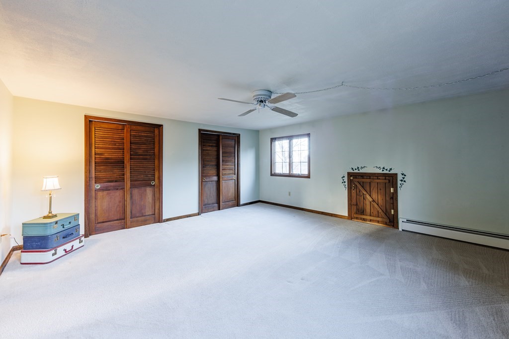 2 Lee Road Groveland, MA 01834 - Photo 35 of 41 a view of a livingroom with a staircase