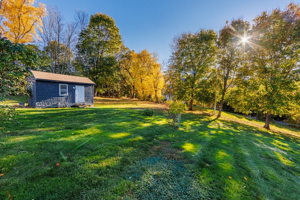 2 Lee Road Groveland, MA 01834 - Photo 5 of 41 a house view with swimming pool in front of it