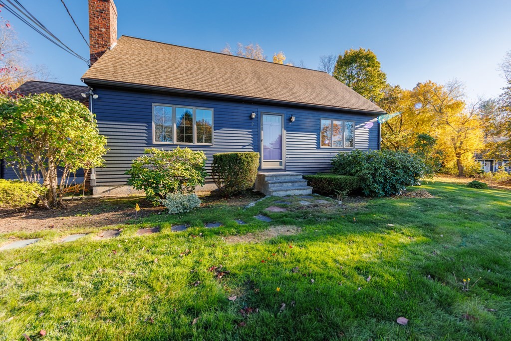 2 Lee Road Groveland, MA 01834 - Photo 6 of 41 a view of a house with a yard and plants