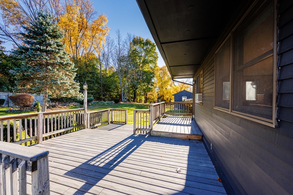 2 Lee Road Groveland, MA 01834 - Photo 8 of 41 a view of balcony with wooden floor and fence