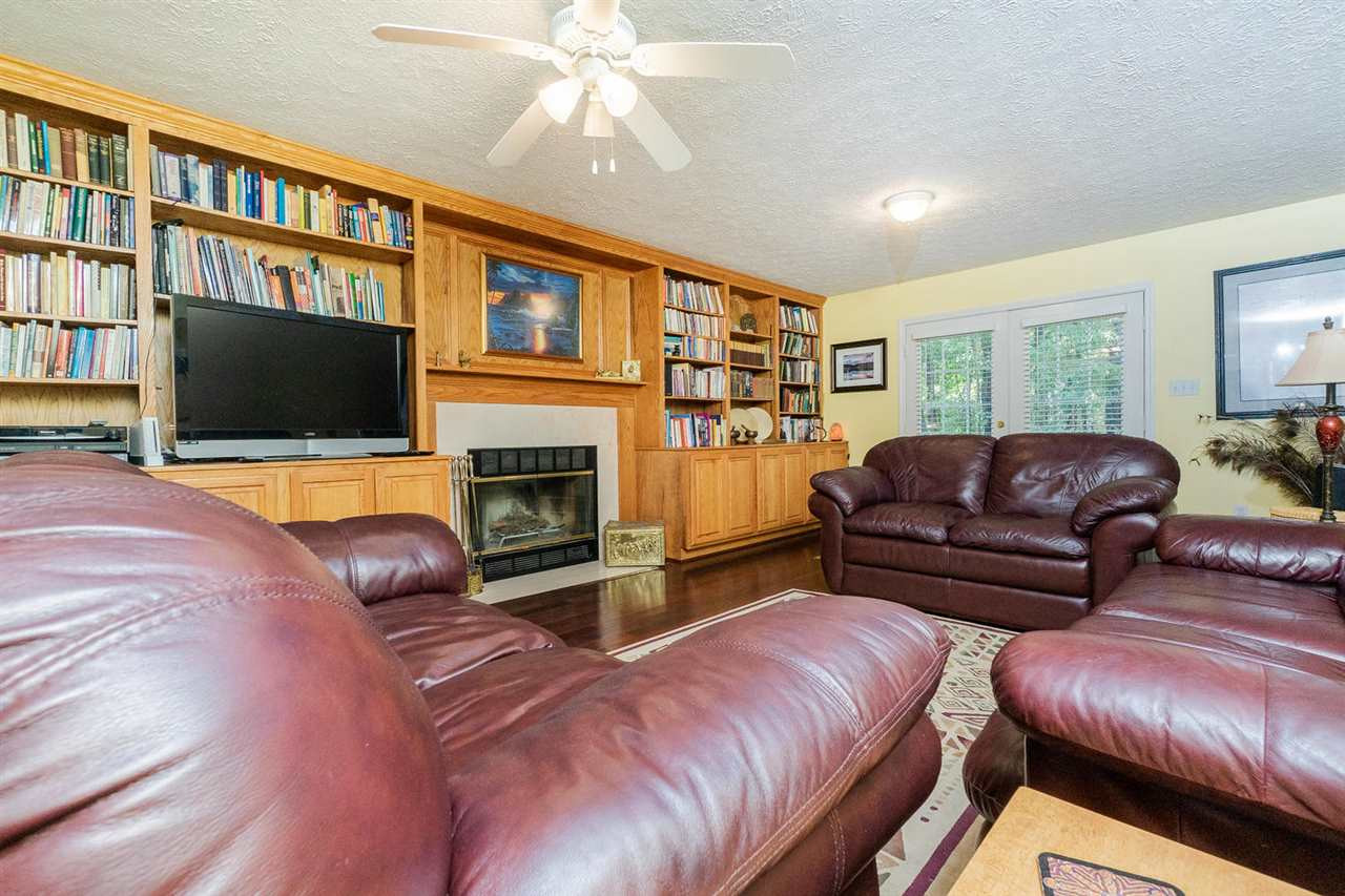 6209 Blair Cee Lane Raleigh, NC 27613 - Photo 8 of 29 Large Family Room with Fireplace and Bookshelves Family Room