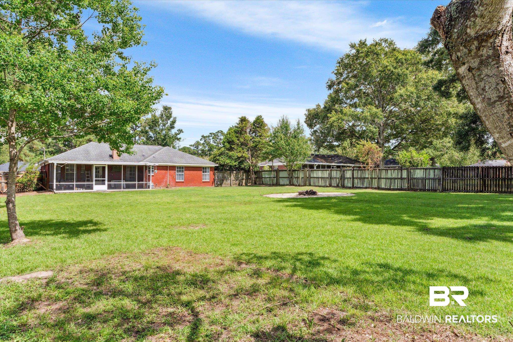 9306 Prairie Drive Semmes, AL 36575 - Photo 18 of 20 View of yard with a sunroom