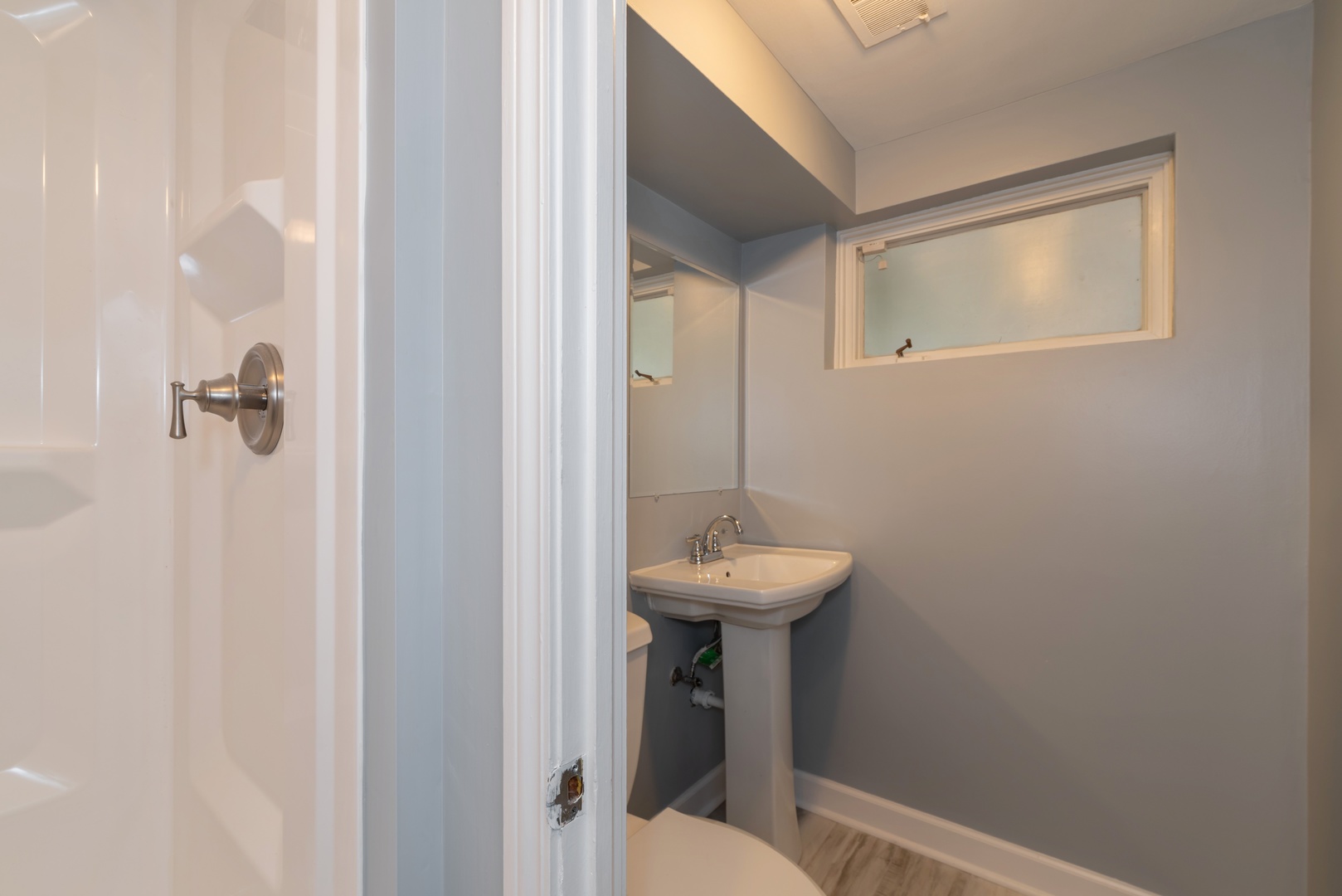 1682 Berkeley Road Highland Park, IL 60035 - Photo 10 of 15 a bathroom with a sink and mirror