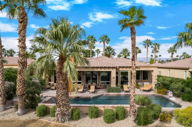 a view of a swimming pool with a lake view