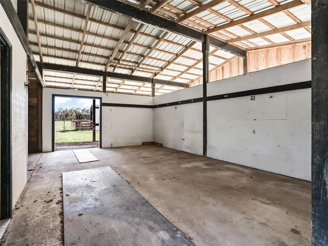 a view of a room with wooden walls
