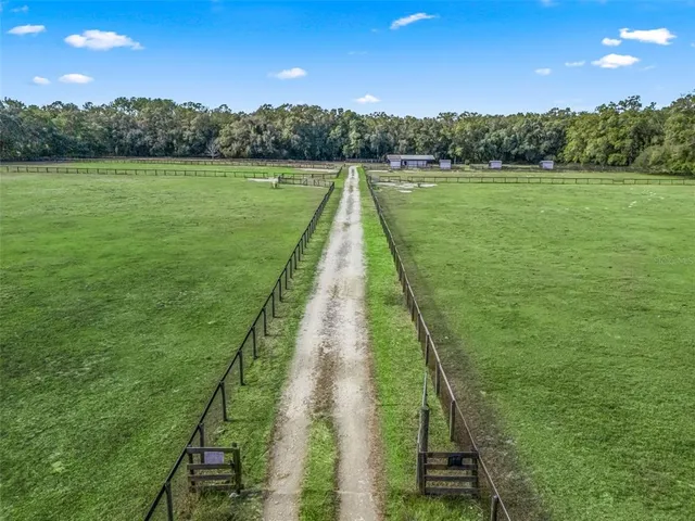 a view of a lake with a yard