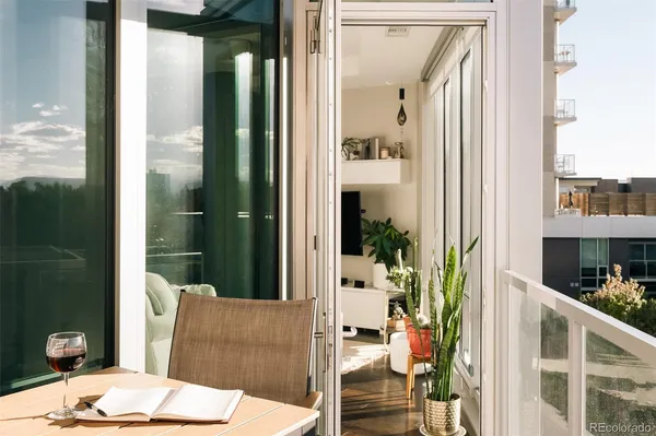 a view of a balcony from a hallway