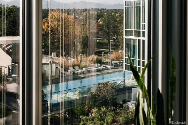 a view of swimming pool from a balcony