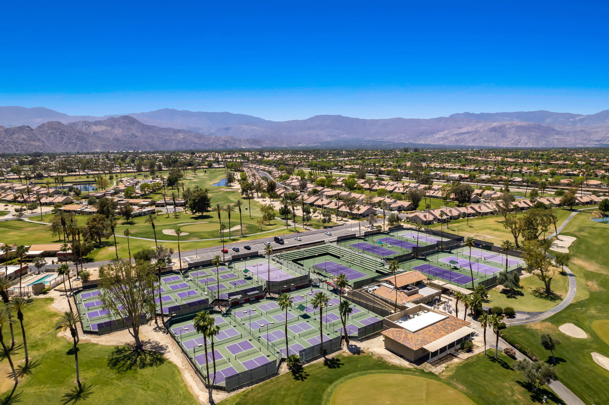 77361 Preston Trail Palm Desert, CA 92211 - Photo 13 of 47 a view of a houses with a yard