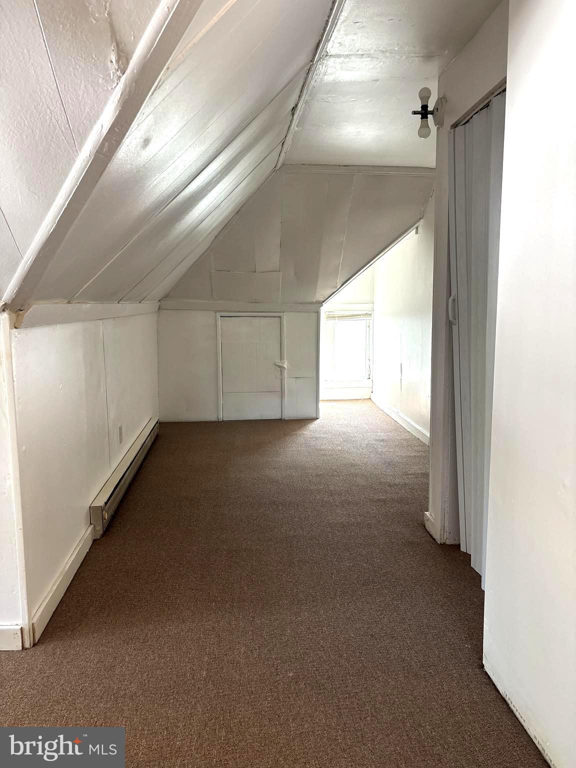 202 Cedar Avenue Pitman, NJ 08071 - Photo 25 of 27 a view of a livingroom with an empty space and a window