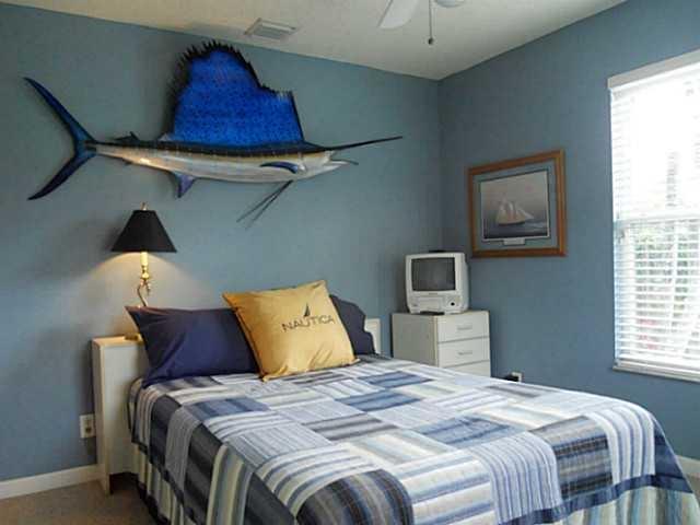 2842 Southwest Montego Terrace Stuart, FL 34997 - Photo 14 of 25 Bedroom