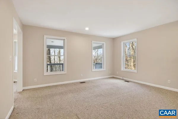 a view of a kitchen with sink and cabinet area